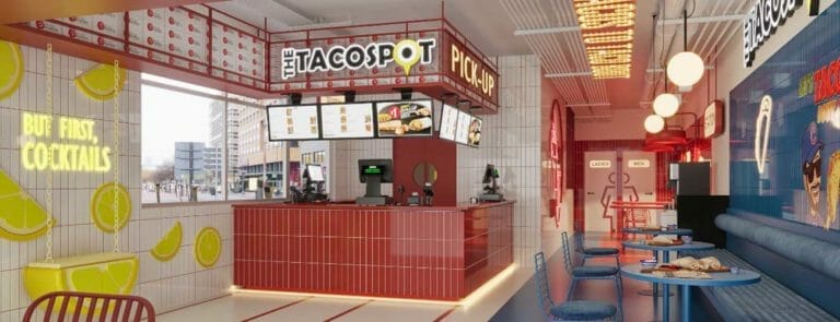 The interior of a fast food restaurant is decorated with bright colors.