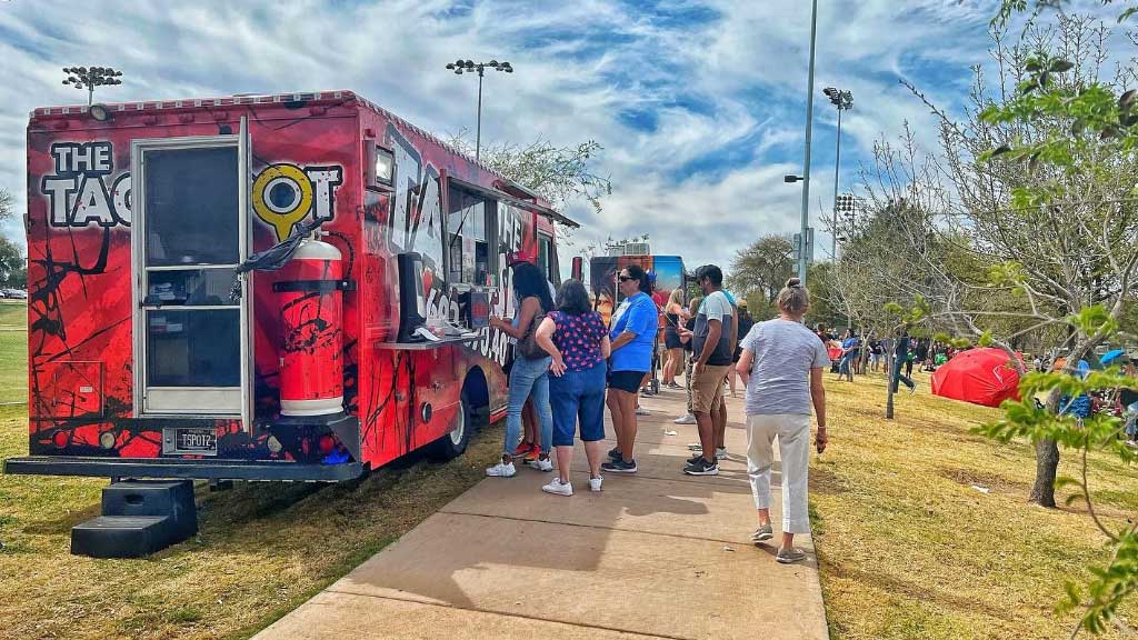 The Taco Spot Food Truck Mexican Food Catering serving people.